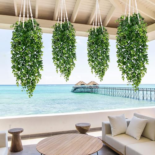 Artificial hanging plants on shelf