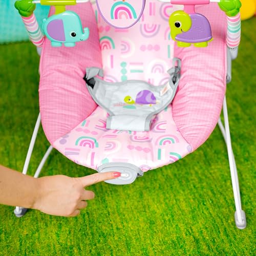 Baby sitting in Bright Starts bouncer seat