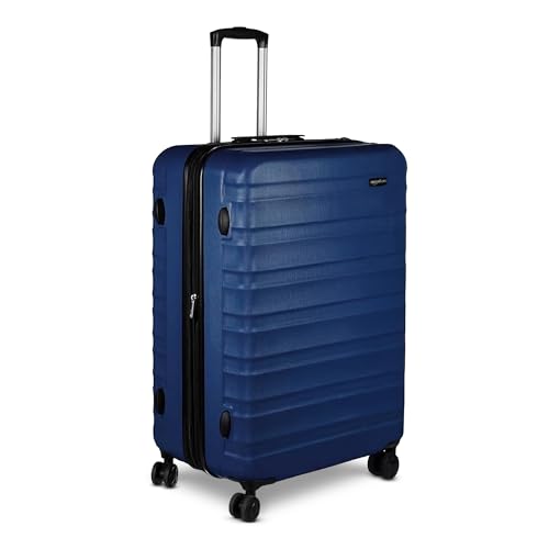 Basics 30-inch hardshell luggage in navy blue front view