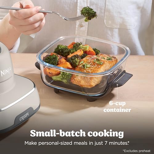 Ninja Crispi air fryer cooking a chicken