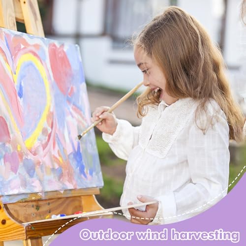 Artist painting on an ESRICH canvas board