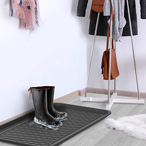 Stalwart boot tray holding multiple shoes