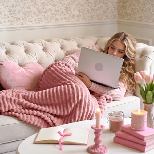 Close up of 3D ribbed texture on BEDELITE pink throw