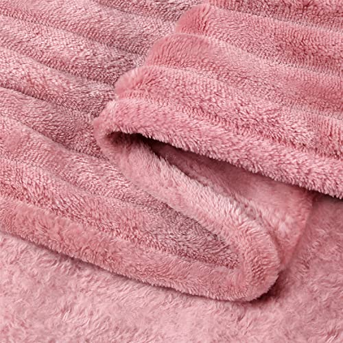 Packaging or folded view of BEDELITE dusty pink blanket