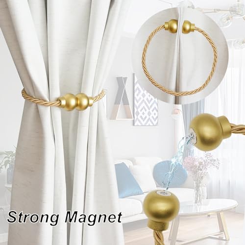 Close up of gold magnetic tieback buckle mechanism