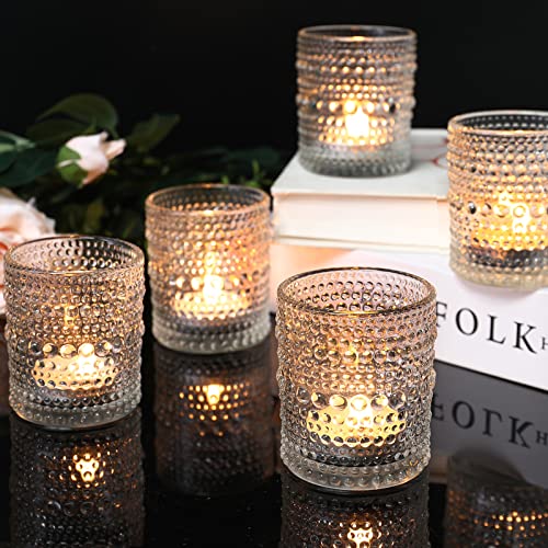 Clear glass votive holders for event centerpieces