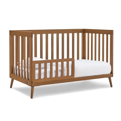 Assembled crib in a nursery setting