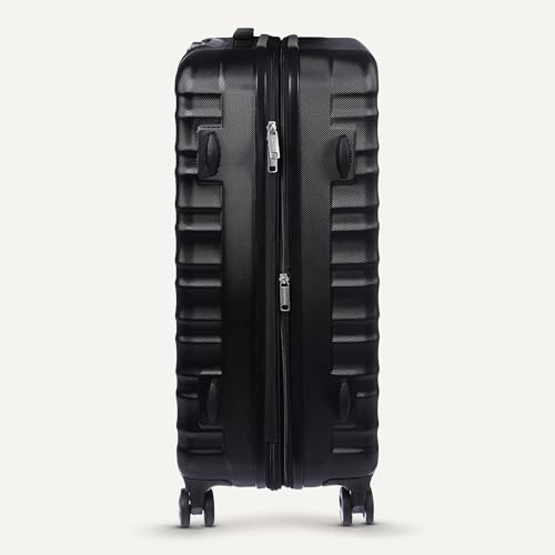 Telescoping handle and top grip of Basics hardside suitcase
