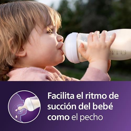 Four pink Philips Avent Natural bottles