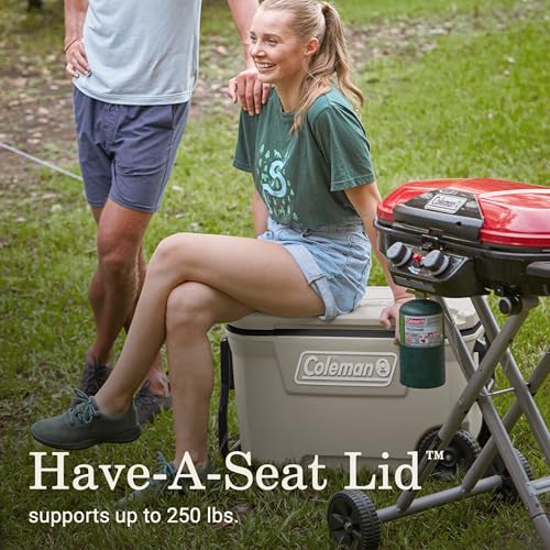 Coleman cooler lid used as a seat in an outdoor setting