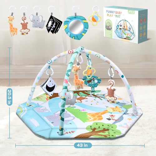 Baby interacting with hanging rattle and mirror