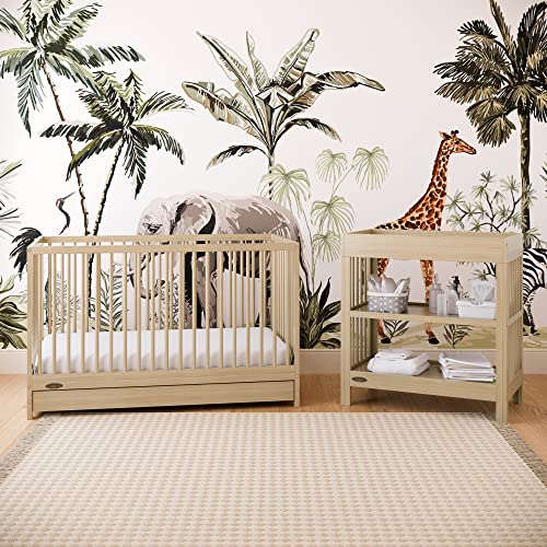 Graco changing table with two storage shelves