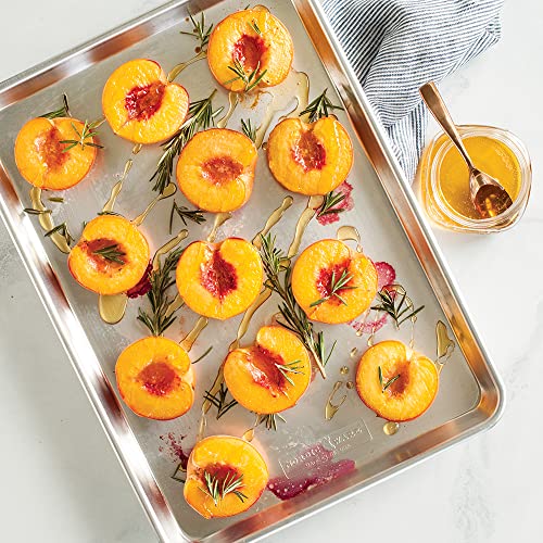 Two aluminum baking sheets stacked